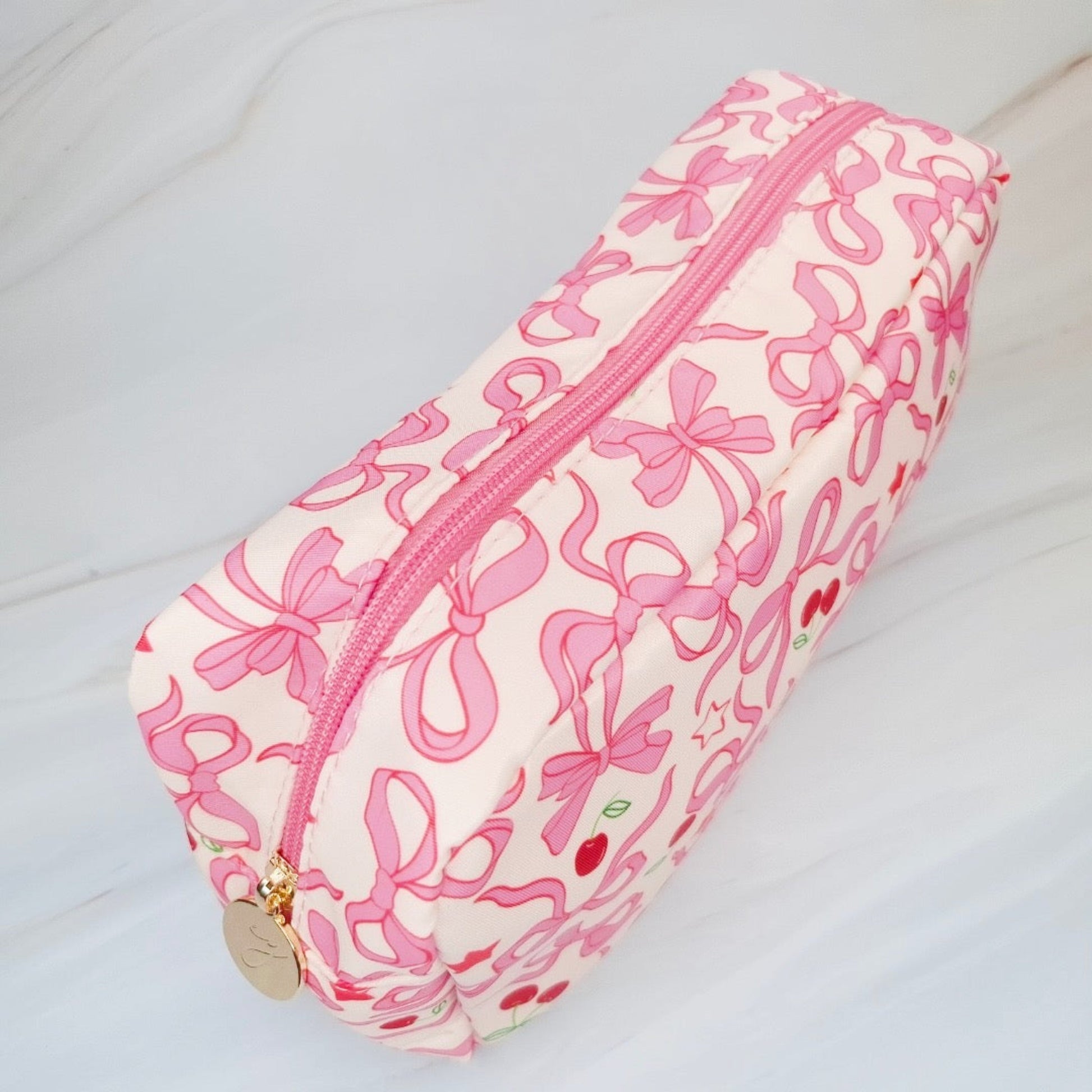 Chic cherry and bow travel pouch – perfect gift for beauty lovers