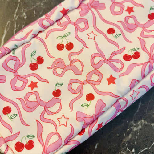 Playful cherry print cosmetic bag for makeup and skincare essentials